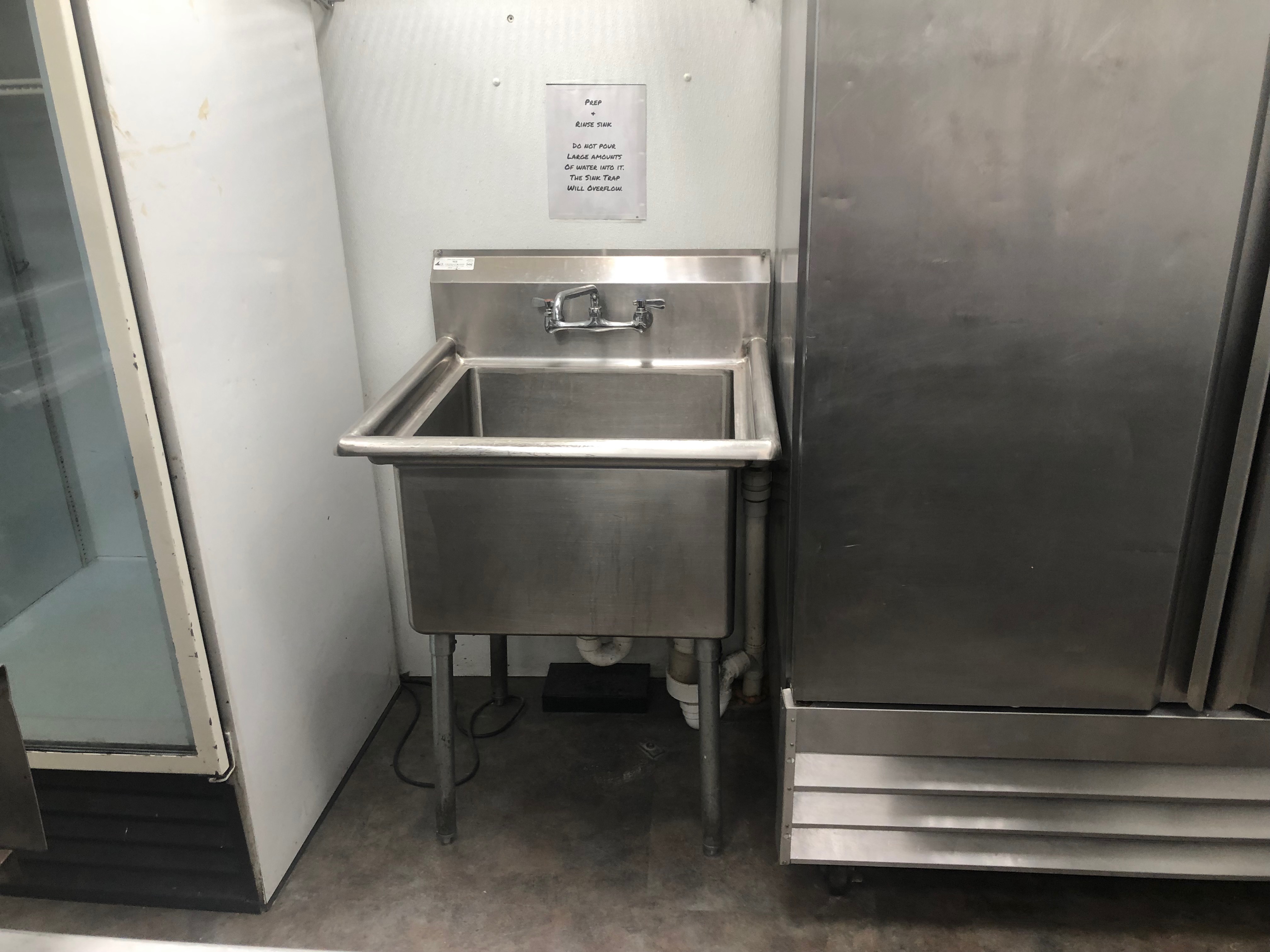 Stainless vegetable preparation sink at the Brookhaven kitchen